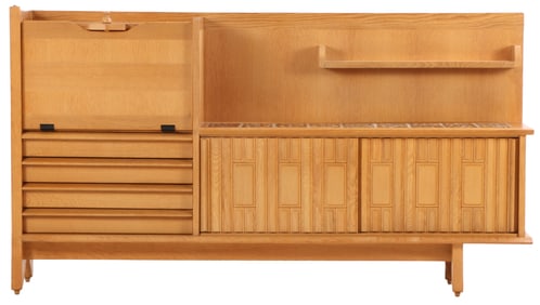 FRENCH OAK CABINET HAVING A FALL FRONT BAR COMPARTMENT AND TILED SURFACE DESIGNED BY