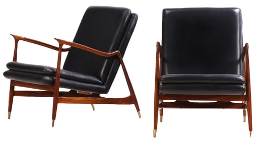 PAIR BRAZILIAN ROSEWOOD AND LEATHER UPHOLSTERED OPEN ARM CHAIRS. ALL BRASS CAPS PRESENT.