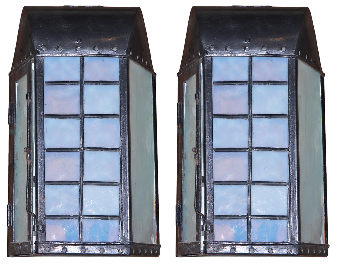PAIR OF IRON LANTERNS HAVING BLUE LEADED GLASS FRONT PANELS AND INTERESTING BUBBLE GLASS SIDE: Pair of iron lanterns having blue leaded glass front panels and interesting bubble glass side panels C 1960. Ht: 17.25" Wd: 10.5" Dpth: 6"