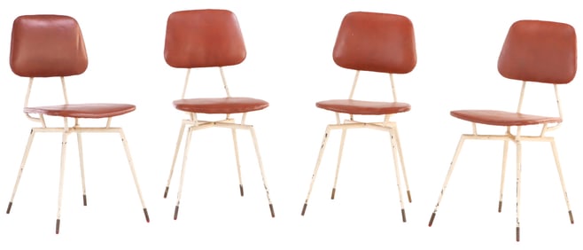 FRENCH FIFTIES SET OF FOUR WHITE PAINTED IRON CHAIRS WITH BRASS-MOUNTED FEET.