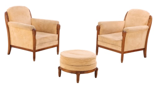 PAIR OF FRENCH CARVED MAHOGANY CLUB CHAIRS WITH MATCHING FOOT STOOL ATTRIBUTED TO SUE ET MARE C