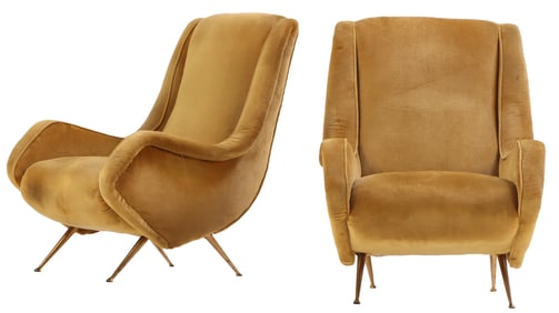 PAIR OF ITALIAN UPHOLSTERED LOUNGE CHAIRS RESTING ON BRASS LEGS C 1950.