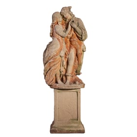 A CAST STONE GARDEN FIGURE DEPICTING TWO FEMALES RESTING ON AN OPTIONAL PEDESTAL.