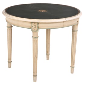 PAINTED FRENCH DINING TABLE HAVING A GILT EMBOSSED LEATHER TOP, TWO ORIGINAL LEAVES C 1945.