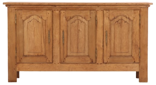 FRENCH PROVINCIAL STRIPPED OAK SIDEBOARD HAVING THREE DOORS. C 1920