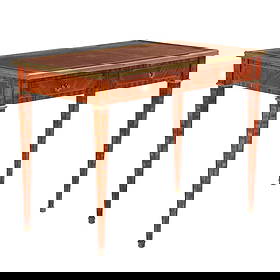 FRENCH INLAID WRITING DESK HAVING TWO DRAWERS AND A GILT TOOLED LEATHER TOP BOUND WITH BRASS C: French inlaid writing desk having two drawers and a gilt tooled leather top bound with brass C 1920. This item is not located at our Philadelphia gallery and is available for pickup at zip code 27260.