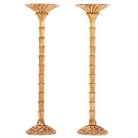 PAIR OF CARVED GILTWOOD TORCHIERES IN THE MANNER OF SERGE ROCHE.