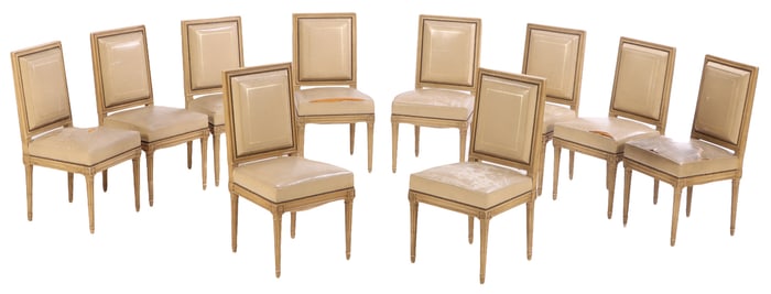 TEN PAINTED LOUIS XVI STYLE LEATHER UPHOLSTERED DINING CHAIRS OF THE HIGHEST QUALITY ATTRIBUTED TO