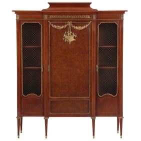 MAHOGANY THREE DOOR BRONZE MOUNTED VITRINE HAVING PARQUETRY INLAY AND METAL MESH IN THE OUTER DOORS.