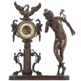 AN ANTIQUE EUROPEAN BRONZE CLOCK HAVING STANDING FIGURE OF MERCURY WITH AN EAGLE AND  RAMS HEADS.