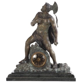 A BRONZE AND STONE SPARTAN CLOCK BY MAITLAND SMITH.