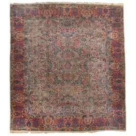 A LARGE ANTIQUE KERMAN RUG 9' x 11'10"