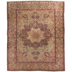A LARGE ANTIQUE KERMAN RUG 8'10" x 12'4"
