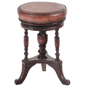 LATE NINETEENTH CENTURY VICTORIAN SWIVEL PIANO STOOL HAVING A LEATHER TOP
