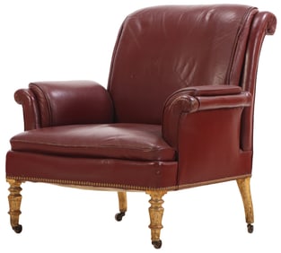 NINETEENTH CENTURY NAPOLEON III GILTWOOD LIBRARY CHAIR UPHOLSTERED IN LEATHER.