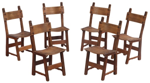 SIX SPANISH OAK DINING CHAIRS C 1900 WITH WOOD SEATS.