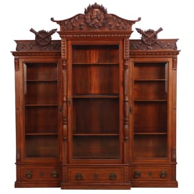 AMERICAN VICTORIAN CARVED MAHOGANY BEVELED GLASS BOOKCASE WITH REMOVABLE CRESTS C 1890.