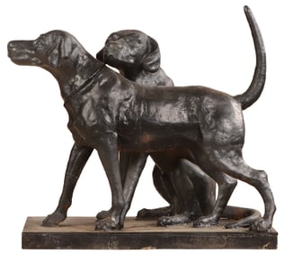 A PAINTED CAST IRON SCULPTURE DEPICTING TWO HOUNDS.
