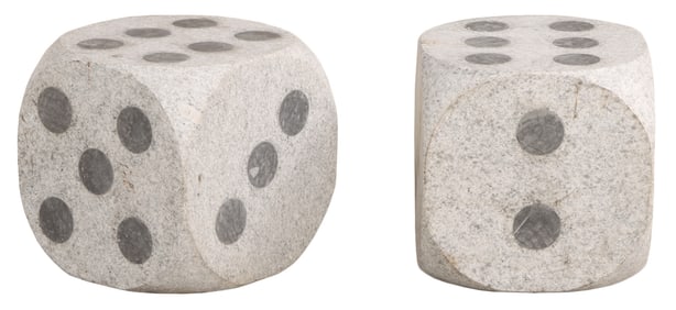 LARGE PAIR OF CARVED GRANITE DICE.