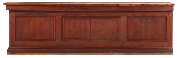 LARGE NINETEENTH CENTURY PINE STORE COUNTER HAVING PANELED FRONT WITH DRAWERS ON REVERSE.