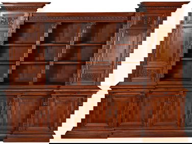 LARGE NINETEENTH CENTURY CARVED WALNUT BOOKCASE WITH OPEN CENTER AND PULL OUT SLIDE. TOP