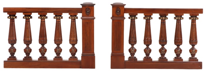 A PAIR OF CARVED MAHOGANY BALUSTRADE PANELS HAVING GILT HIGHLIGHTS.