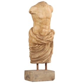 A SMALL CARVED MARBLE TORSO MOUNTED ON AN IRON STAND.