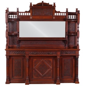 AN AMERICAN MODERN GOTHIC CARVED WALNUT SIDEBOARD, C. 1875, ATTRIBUTED TO DANIEL PABST, PHILADELPHIA