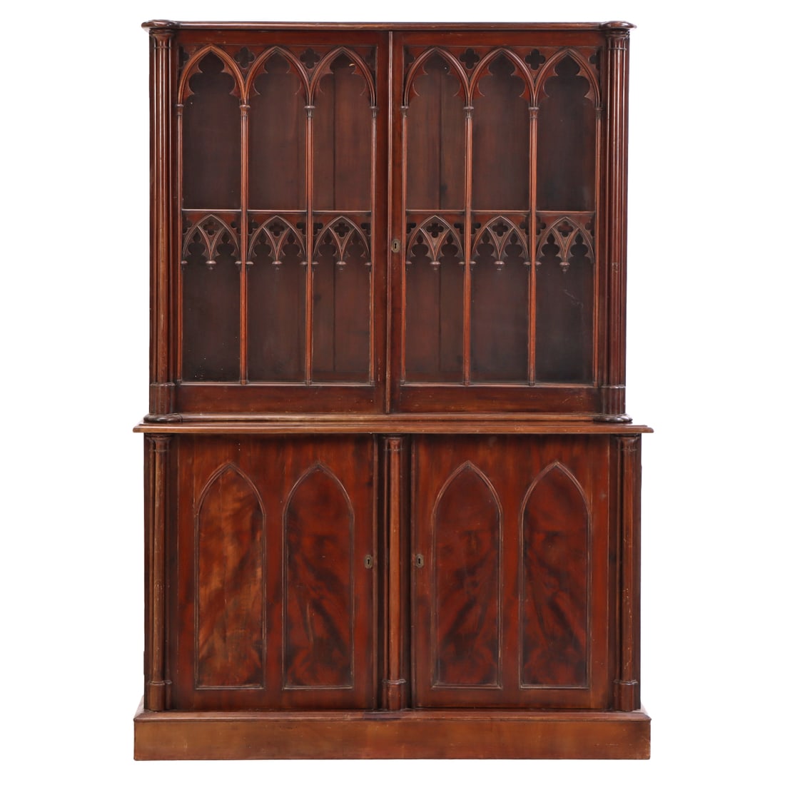 TWO PART GOTHIC REVIVAL MAHOGANY BOOKCASE C 1850 HAVING GLASS DOORS OPENING TO FOUR DRAWERS OVER (1 of 8)