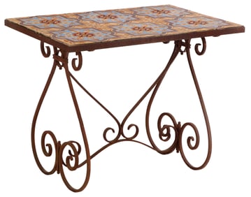 IRON TABLE HAVING A SCROLL FORM BASE AND CERAMIC TILE TOP C 1945.