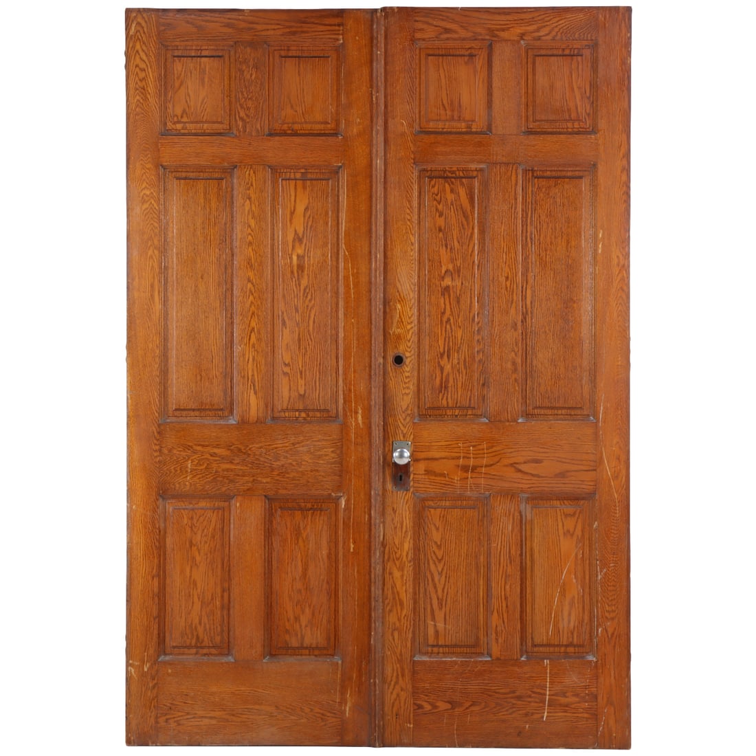 PAIR OF RAISED PANEL OAK DOORS C 1910.: Pair of raised panel oak doors C 1910. Each door has a width of 32.5". Ht: 93.5" Wd: 32.5" Dpth: 1.75"