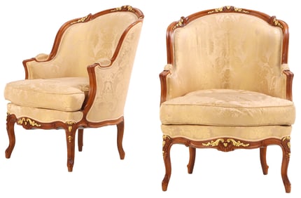 PAIR OF FRENCH LOUIS XV STYLE UPHOLSTERED BERGERE CHAIRS C 1940 HAVING GILT DETAILS.