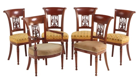 A SET OF SIX NINETEENTH CENTURY CARVED WALNUT DIRECTOIRE STLYE DINING CHAIRS