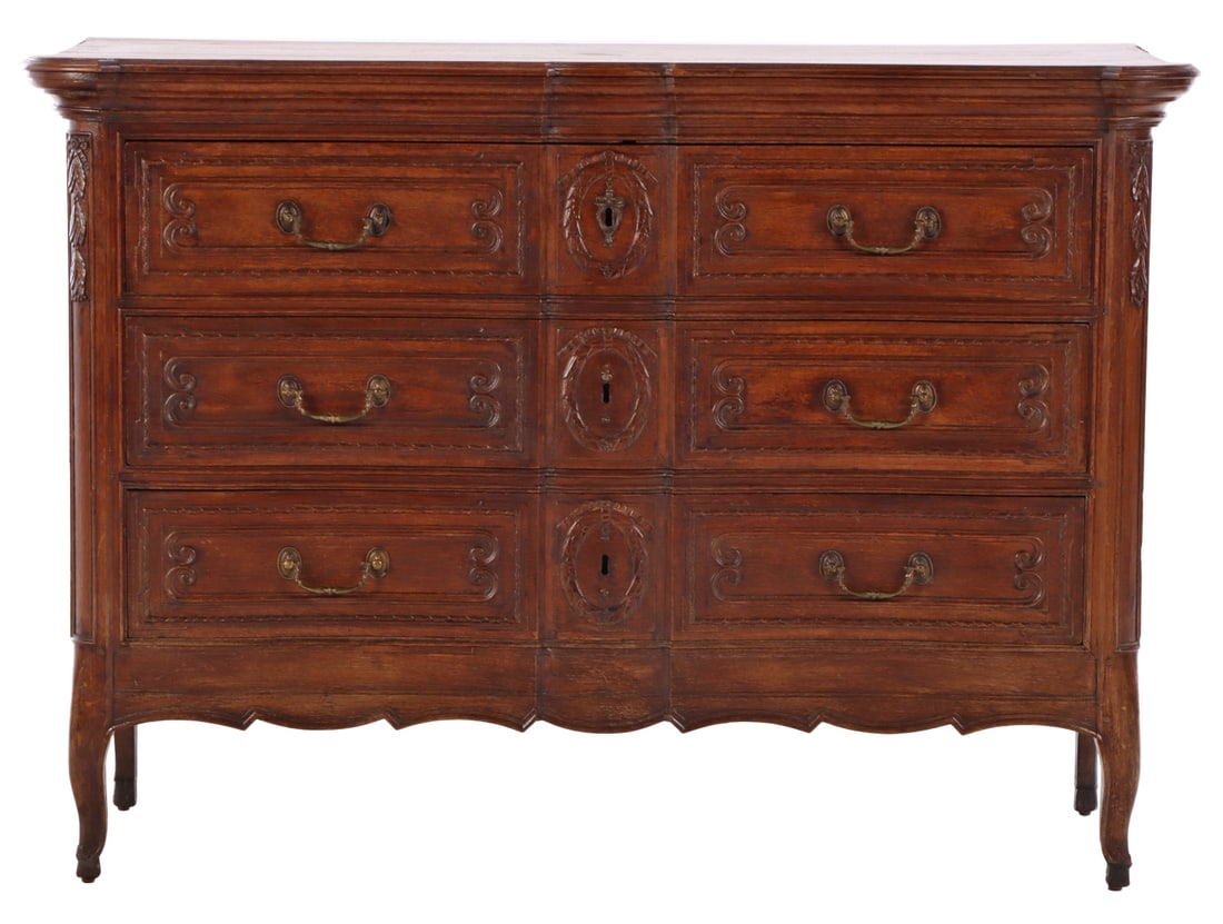 EIGHTEENTH CENTURY CARVED OAK FRENCH COMMODE HAVING THREE DRAWERS. (1 of 7)