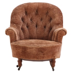 FRENCH NAPOLEON III LOUNGE CHAIR HAVING BUTTON BACK UPHOLSTERY AND TURNED FEET.