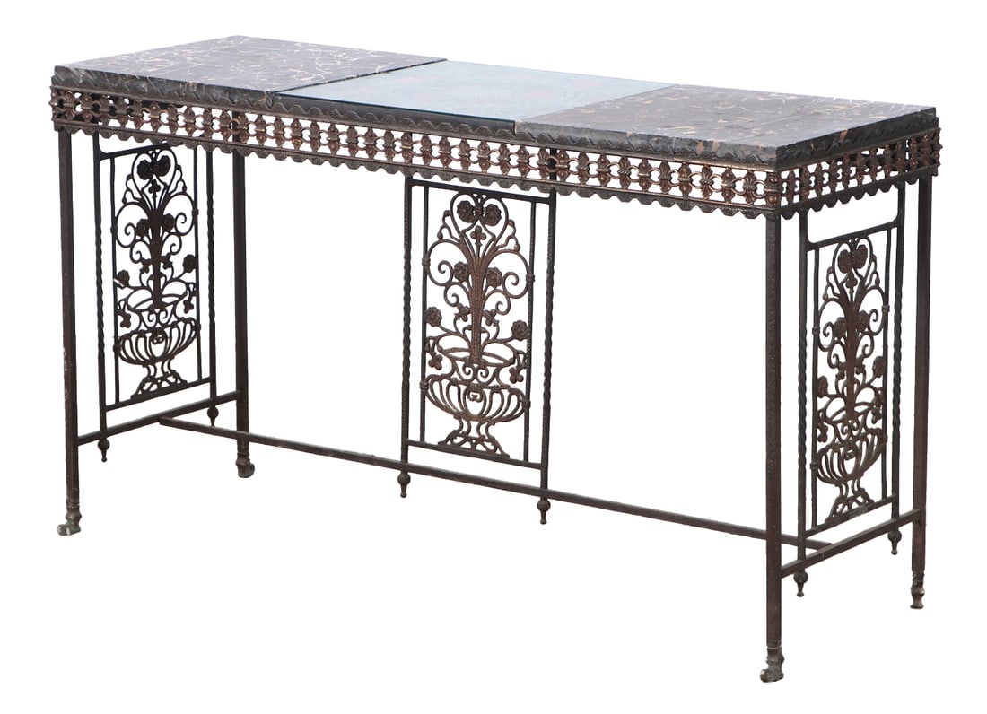AN OSCAR BACH ATTRIBUTED WROUGHT IRON CONSOLE TABLE HAVING GILT ACCENTS AND A MARBLE TOP C 1920. (1 of 9)