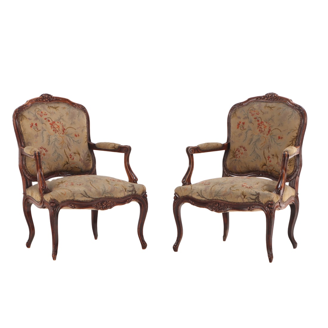 PAIR FRENCH CARVED WALNUT LOUIS XV STYLE PETIT POINT UPHOLSTERED ARM CHAIRS C 1900.: Pair French carved walnut Louis XV style petit point upholstered arm chairs C 1900. Ht: 37" Wd: 27" Dpth: 23" Seat: 15"