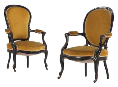 TWO FRENCH NINETEENTH C EBONIZED OPEN ARM CHAIRS WITH UPHOLSTERED SEAT AND BACK.