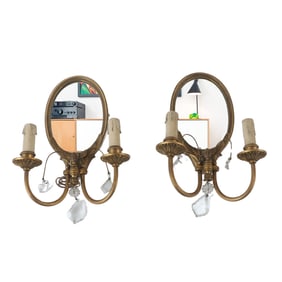 PAIR OVAL BRASS WALL SCONCES HAVING CENTRAL MIRROR AND TWO LIGHTS C 1945.