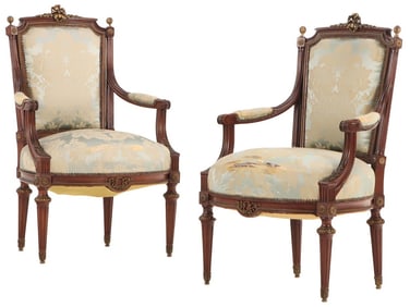 PAIR OF MAHOGANY LOUIS XVI STYLE ARM CHAIRS WITH EXTENSIVE BRONZE MOUNTS THROUGHOUT C 1910.