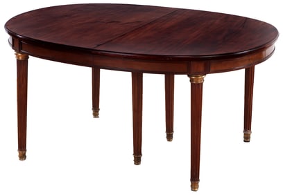 FRENCH MAHOGANY LOUIS XVI STYLE BRONZE MOUNTED DINING TABLE HAVING TWO LEAVES C 1910.