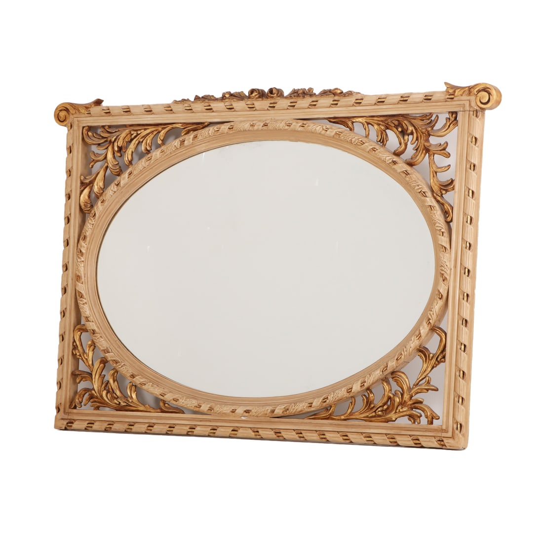 RELIEF CARVED, PAINTED AND GILT MIRROR C 1925 HAVING AN OVAL PLATE GLASS MIRROR.: Relief carved, painted and gilt mirror C 1925 having an oval plate glass mirror. Ht: 39" Wd: 58"