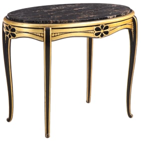 FRENCH ART DECO CENTER TABLE BY PAUL FOLLOT, CIRCA 1920. BLACK LACQUER AND GILT, MARBLE TOP.