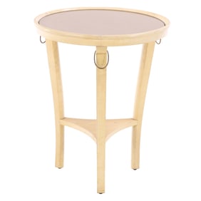 PARCHMENT COVERED TABLE HAVING A MIRRORED TOP AND BRASS DETAILS IN THE MANNER OF ANDRE ARBUS.