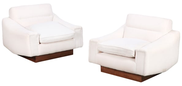 PAIR OF LOW SLUNG LOUNGE CHAIRS C 1960 WITH NEW FABRIC.