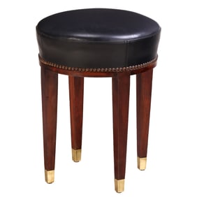 FRENCH MAHOGANY AND LEATHER STOOL IN THE MANNER OF JEAN-MICHEL FRANK C 1940.