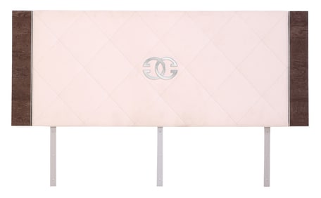AN UPHOLSTERED KING SIZE HEADBOARD BY GUCCI.