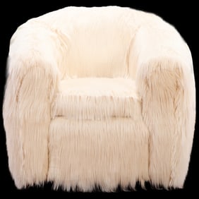 A "POLAR BEAR" CHAIR UPHOLSTERED IN FAUX GOAT SKIN.