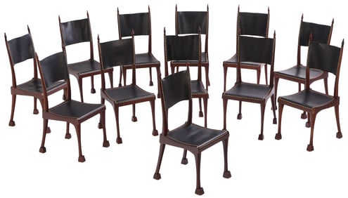 TWELVE SOLID MAHOGANY AND LEATHER DINING ROOM CHAIRS.