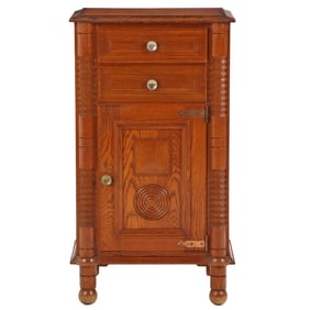 FRENCH OAK BAR CABINET HAVING GEOMETRIC MOTIFS IN THE MANNER OF CHARLES DUDOUYT C 1940.